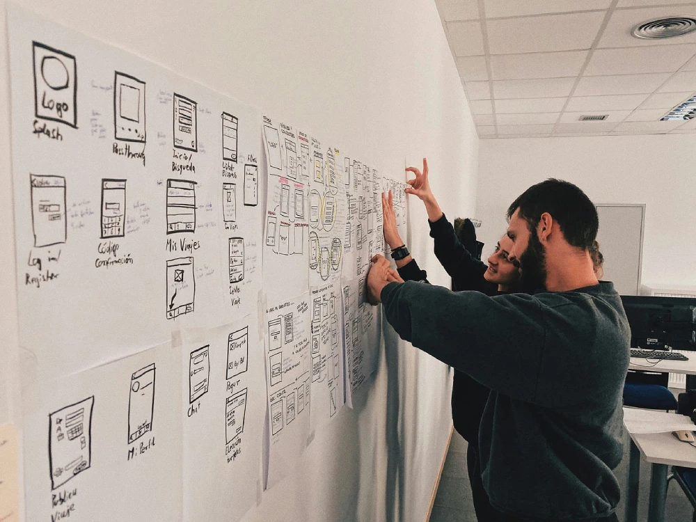 People working on WordPress website support and security monitoring